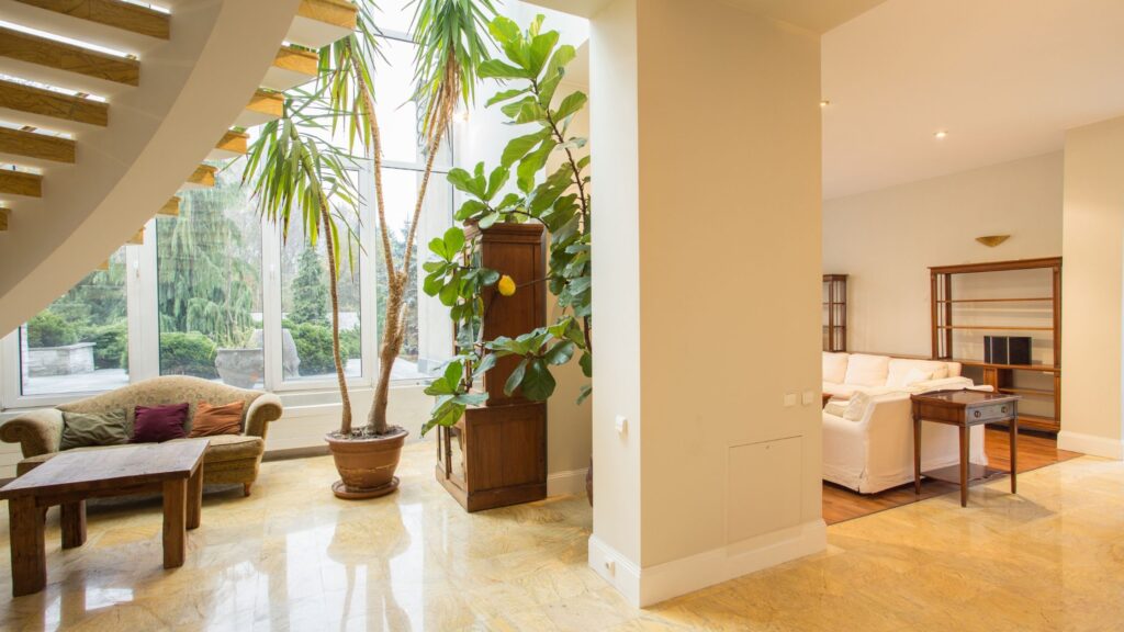 Modern renovated home interior with updated flooring, natural lighting, and contemporary furnishings, showcasing the cost of full home renovation in Ontario.